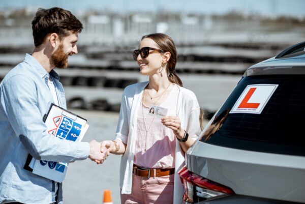 instructor with student at the driver 39 s school HN3AMHF 1600x1200 1 600x401 1