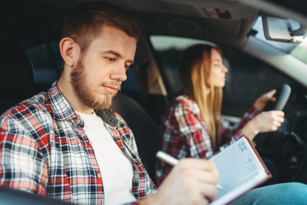 male instructor and female student driving lesson LJCWV68 1600x1200 1 600x401 1